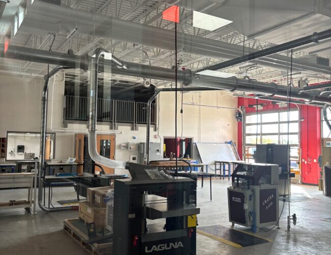 Exposed ceiling painted with white dryfall