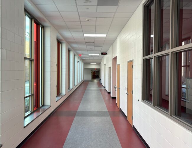 Painted concrete block walls in school corridor